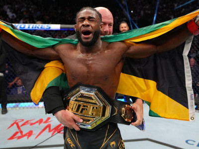 Sterling ekes out decision over Yan to unify title