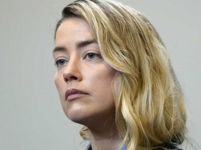 Amber Heard says Johnny Depp struck her when on drugs