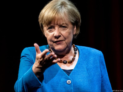 Ukraine war: Angela Merkel defends her record on Putin