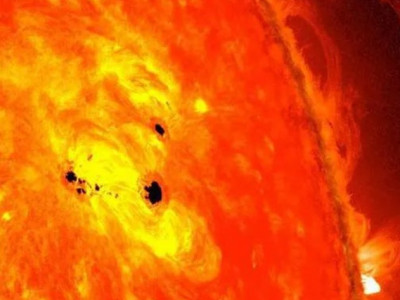 The giant sunspot pointing at the Earth has almost doubled in a day