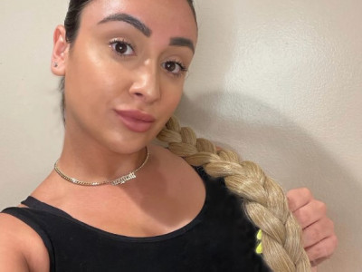 TikTokers Are Going Wild for the Pony Braid Summer Hairstyle