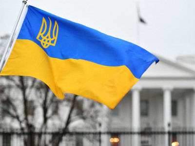 In the US, there are many yellow and blue flags on houses