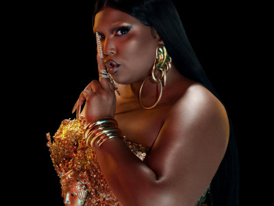 Lizzo Showed Off a New Yitty Thong, but It's the Wavy Partial Box Braids for Me