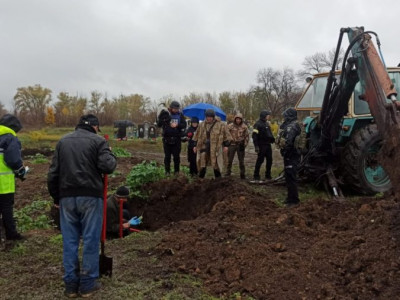 Mass grave with 17 bodies found in Kharkiv region