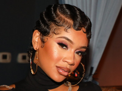 Fans Are Enamored and Straight-Up Terrified by Saweetie's Cherry Stiletto Nails