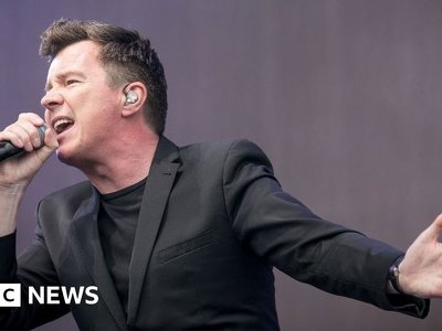 Glastonbury: Rick Astley and Queens of the Stone Age added to line-up