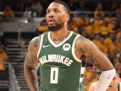 Bucks' Lillard has Achilles strain, status unclear