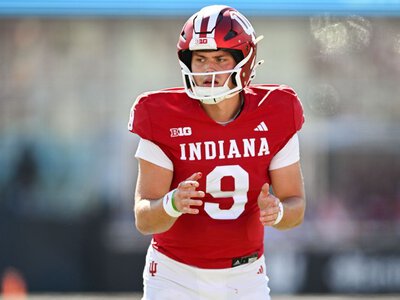 Agent: QB Rourke led Indiana to CFP on torn ACL