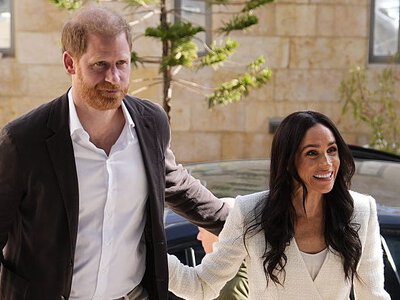 Meghan Markle Wears White Suit on Day 1 of Her Visit to Jordan