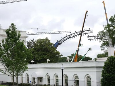 The White House has begun building an arena for a UFC tournament to mark U.S. Independence Day