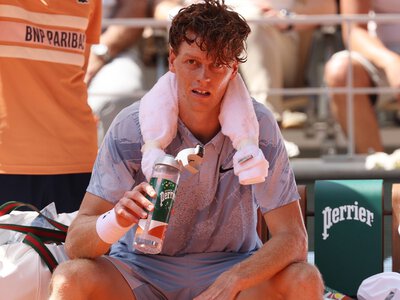 Jannik Sinner knocked out of French Open after suffering with cramp when two sets up and game from winning second round match