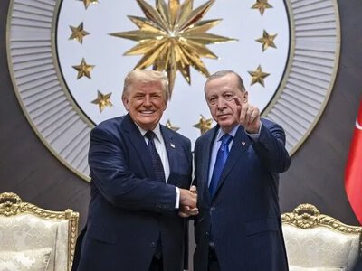 Trump arrived at the NATO summit in Ankara, where he was met by Erdogan