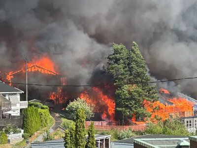A massive fire in Norway has destroyed over 100 homes and continues to spread