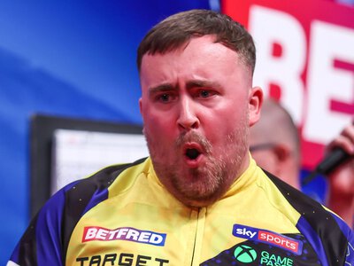 World Matchplay Darts: Luke Littler hits-nine darter in epic 11-8 win over Nathan Aspinall as Michael van Gerwen beaten