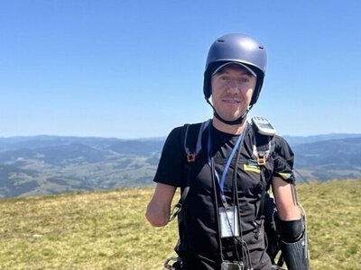 Veteran who lost all four limbs in war fulfills dream and paraglides over Carpathians