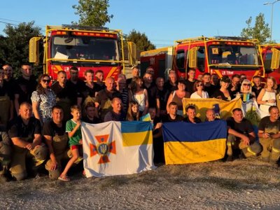 Ukrainian rescuers return from France after nearly two weeks battling massive wildfires
