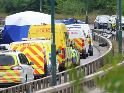 Seven people have died in a road accident in Britain, including two police officers