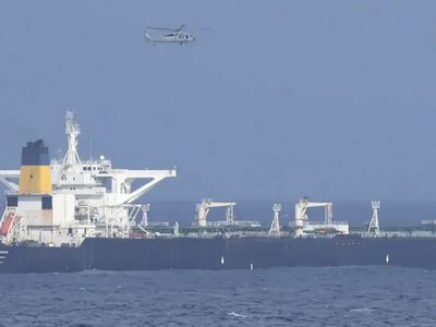 A tanker off the coast of Oman was struck by an unknown projectile