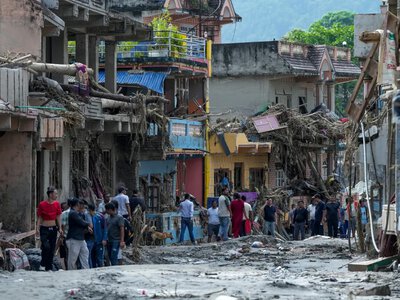 Almost 2,500 people are considered missing after massive floods in Nepal and China, while 579 have died