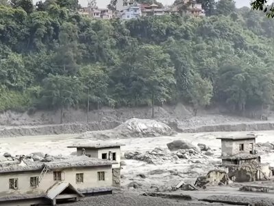 In Nepal, 24 bodies were found in one house after the flood, including a child among the dead