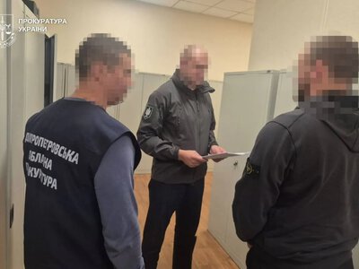 Three police officers in Dnipropetrovsk region suspected of armed robbery involving gunfire for $68,000