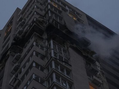 Russian drones strike 24-story building and transport facility in Kyiv, killing two and injuring one