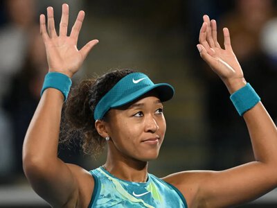 Tennis player Osaka showed off a crane-patterned outfit in Tokyo before defeating Paolini